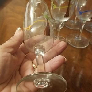 Set of eight champagne glasses, hand painted